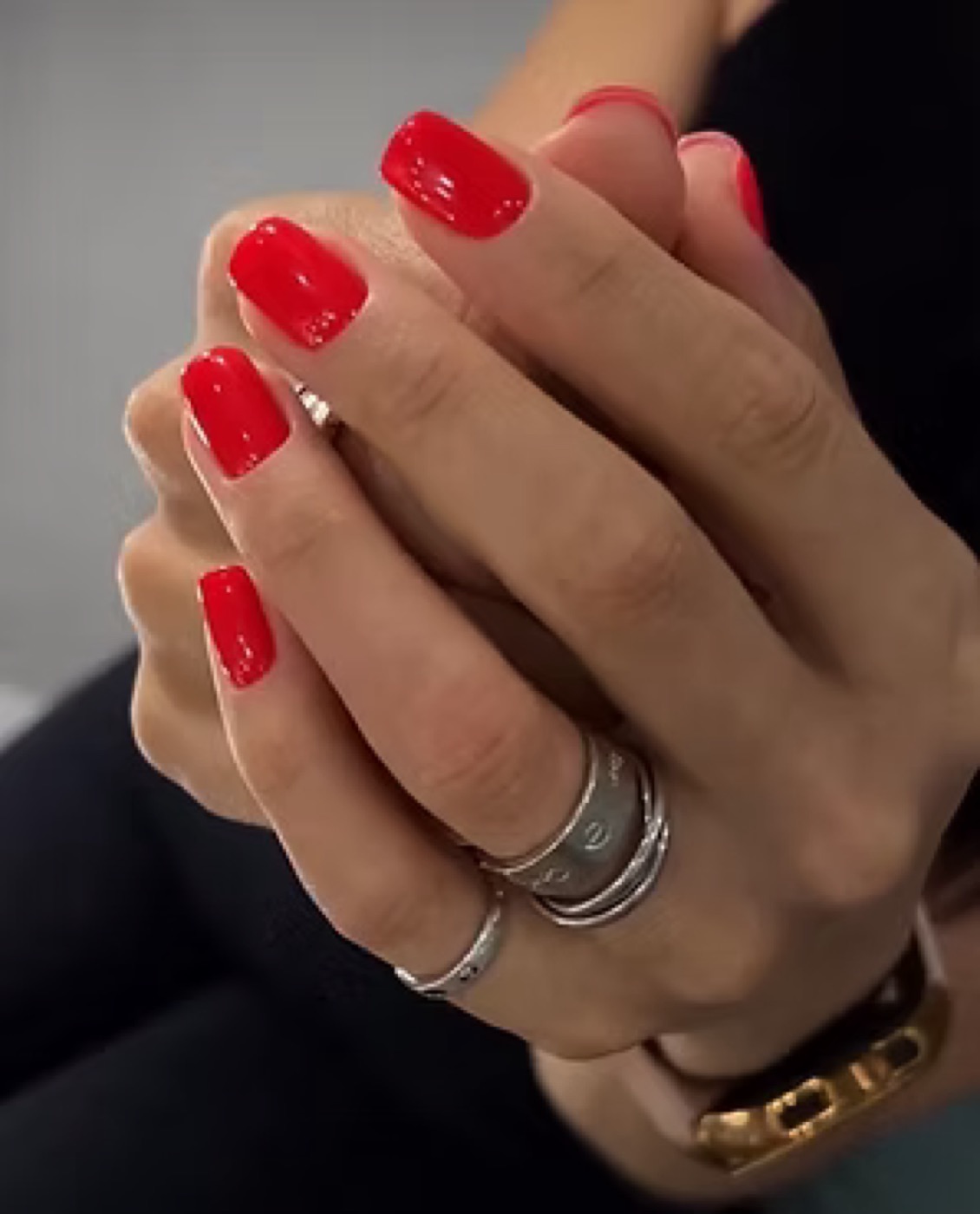 Red gel polish on square-shaped nails