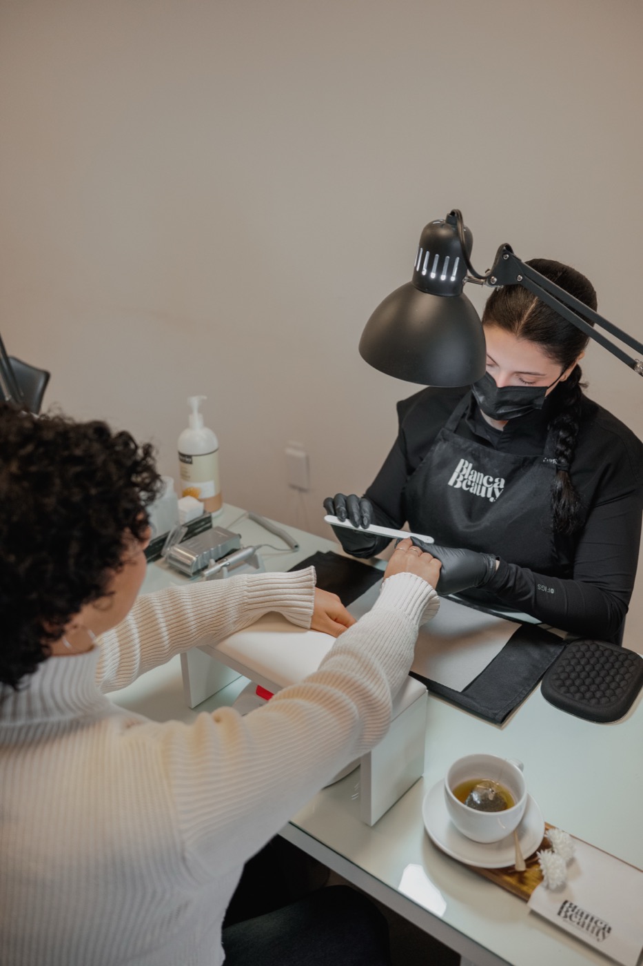 Tea served during a manicure session at Blanca