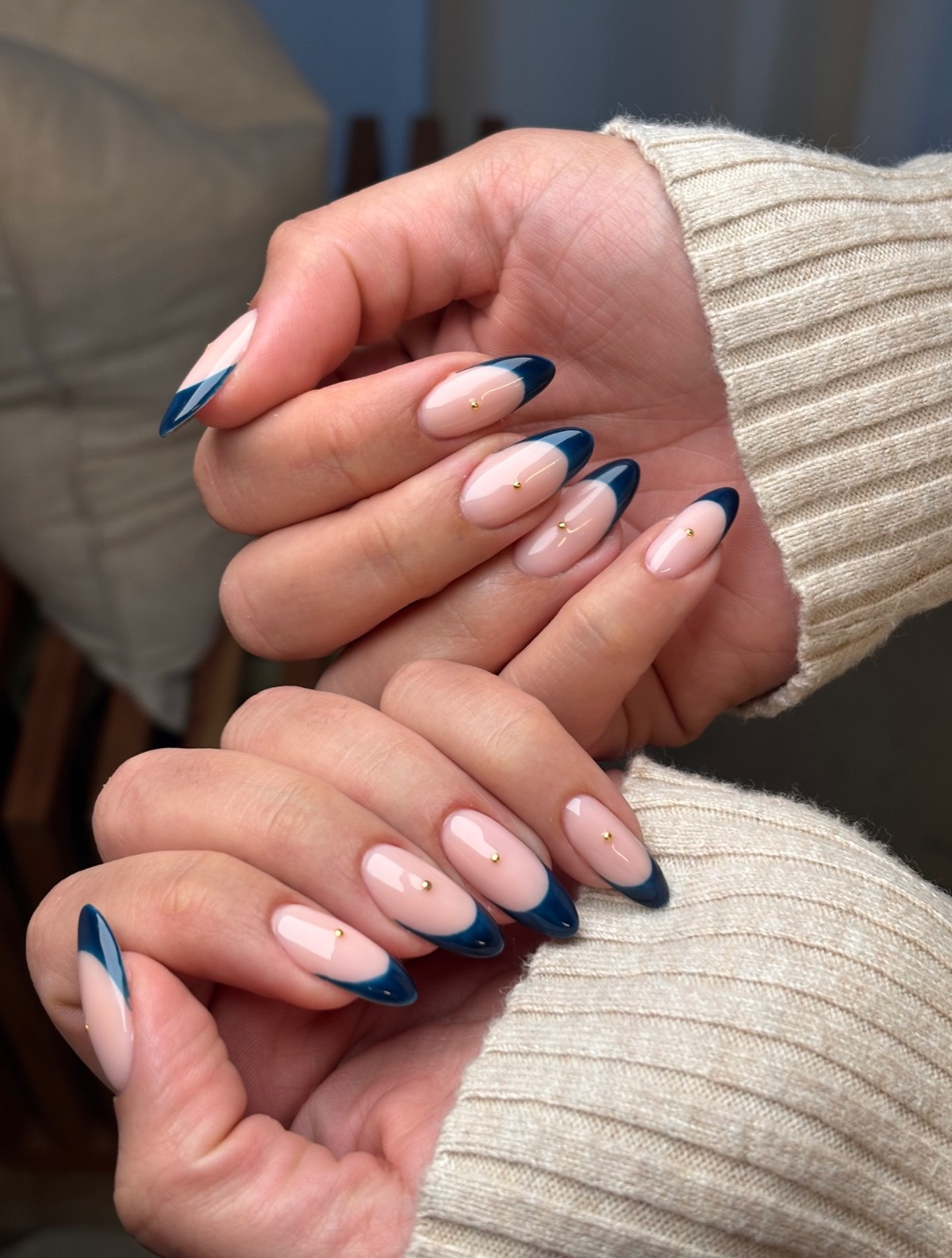 Navy french tip with gold-dot accent